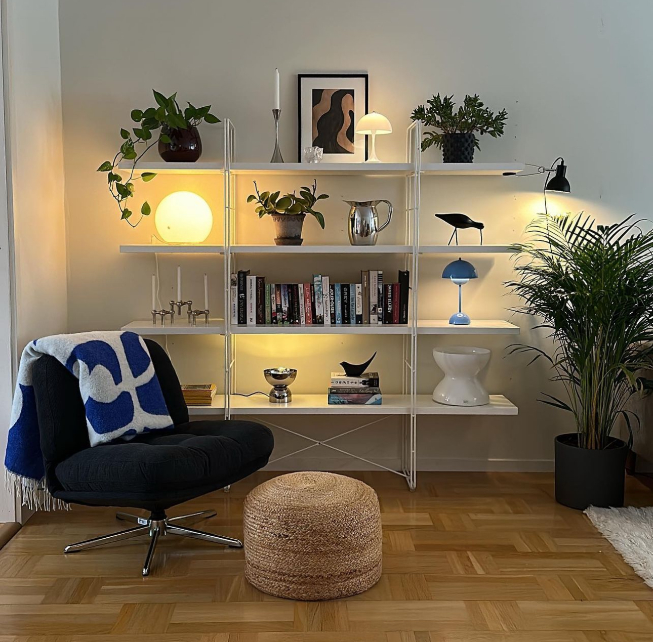 Scandinavian home with IKEA Enetri shelf and black Dyvlinge chair.