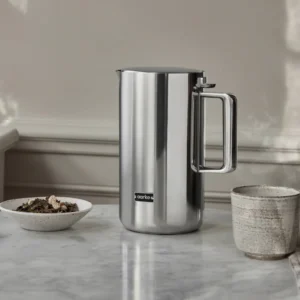 Tea kettle in stainless steel by Swedish Aarke.