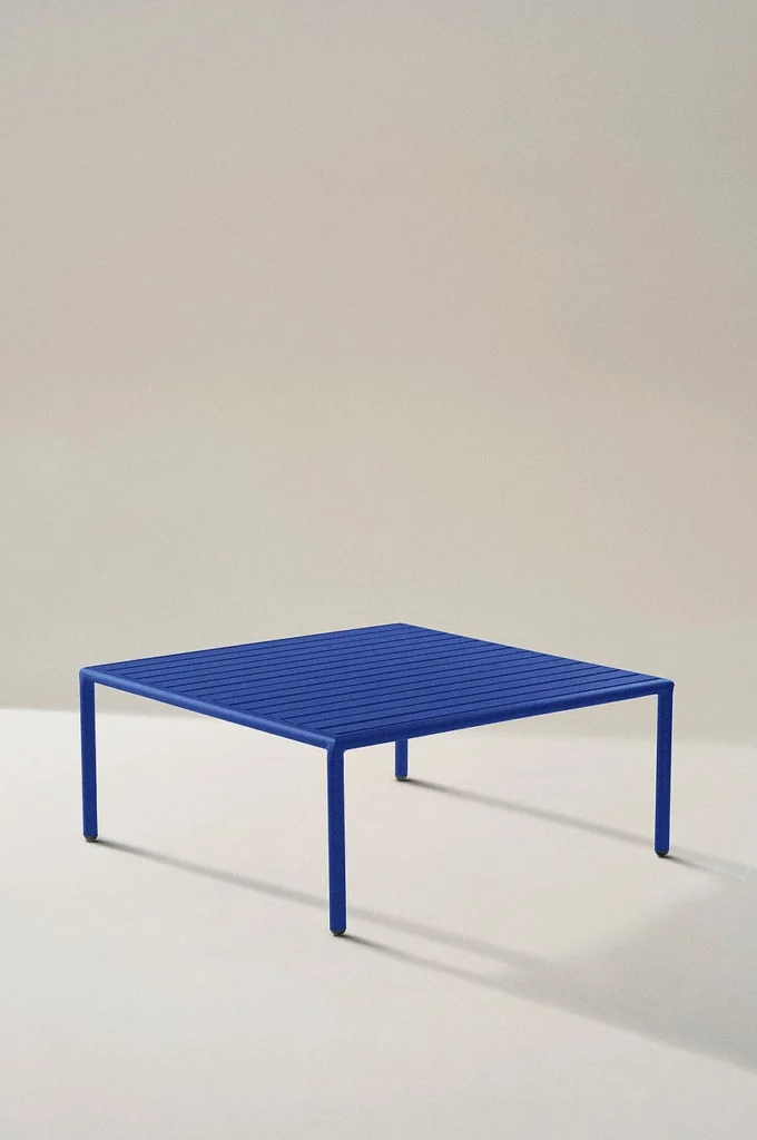 Bright blue outdoor table called Menton from Jotex.