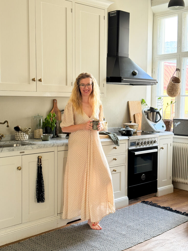 Daniela in her kitchen in a Scandinavian apartment in Gothenburg Sweden