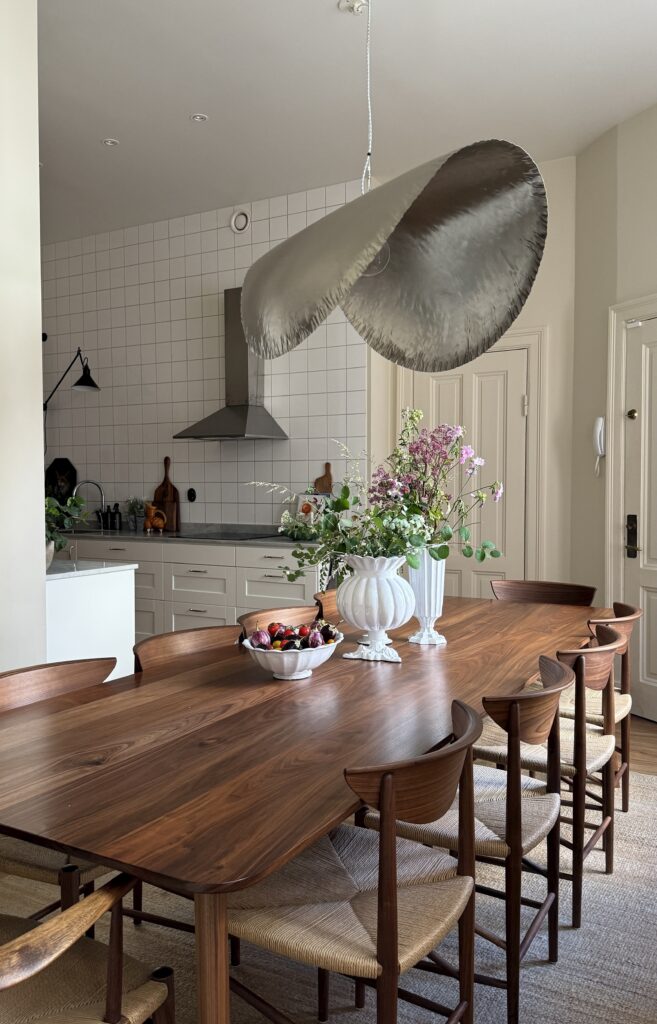 Dining area in the kitchen with walnut table and &tradition chairs.