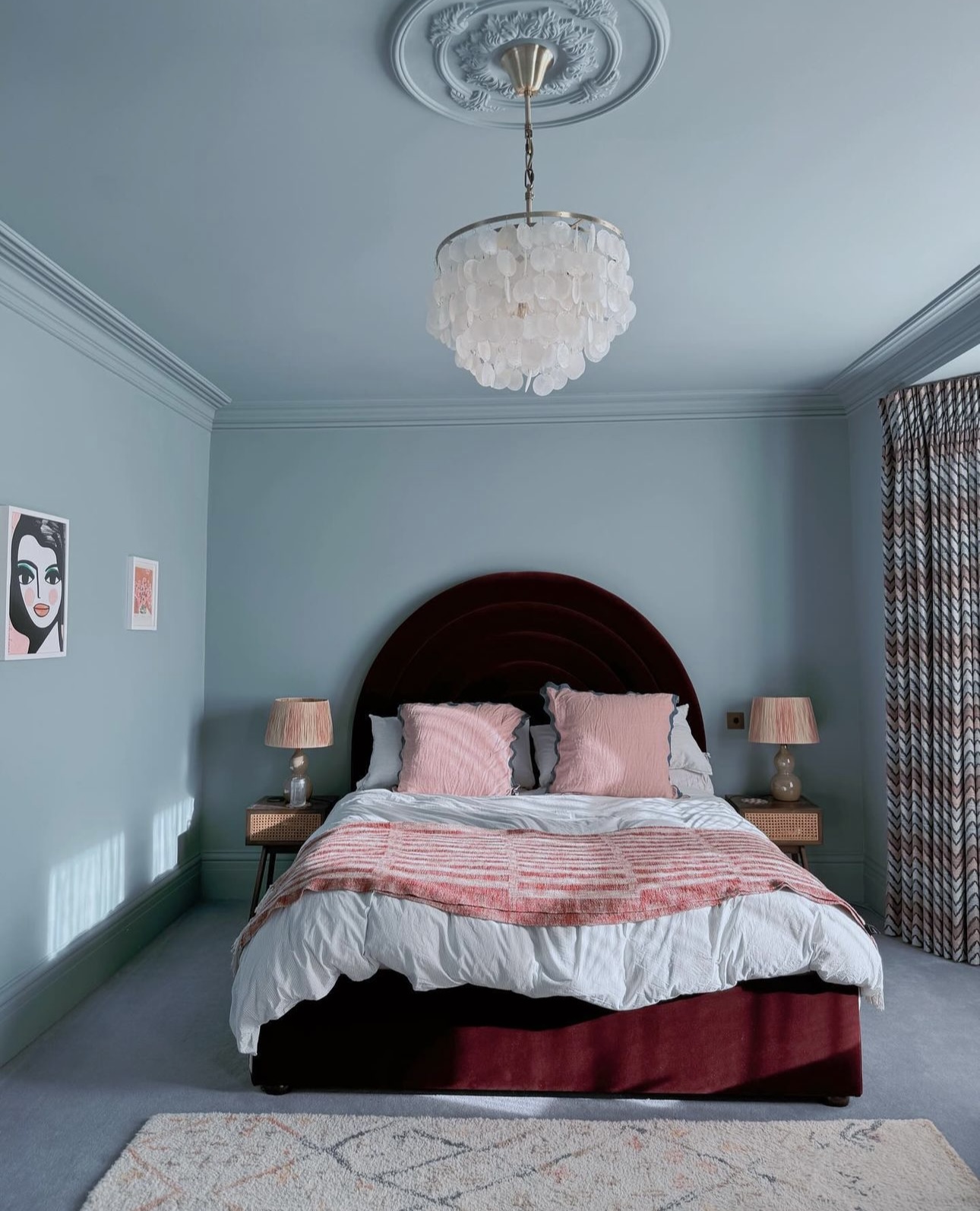 A beautifully color drenched bedroom in a light blue color by the account thehovehome.